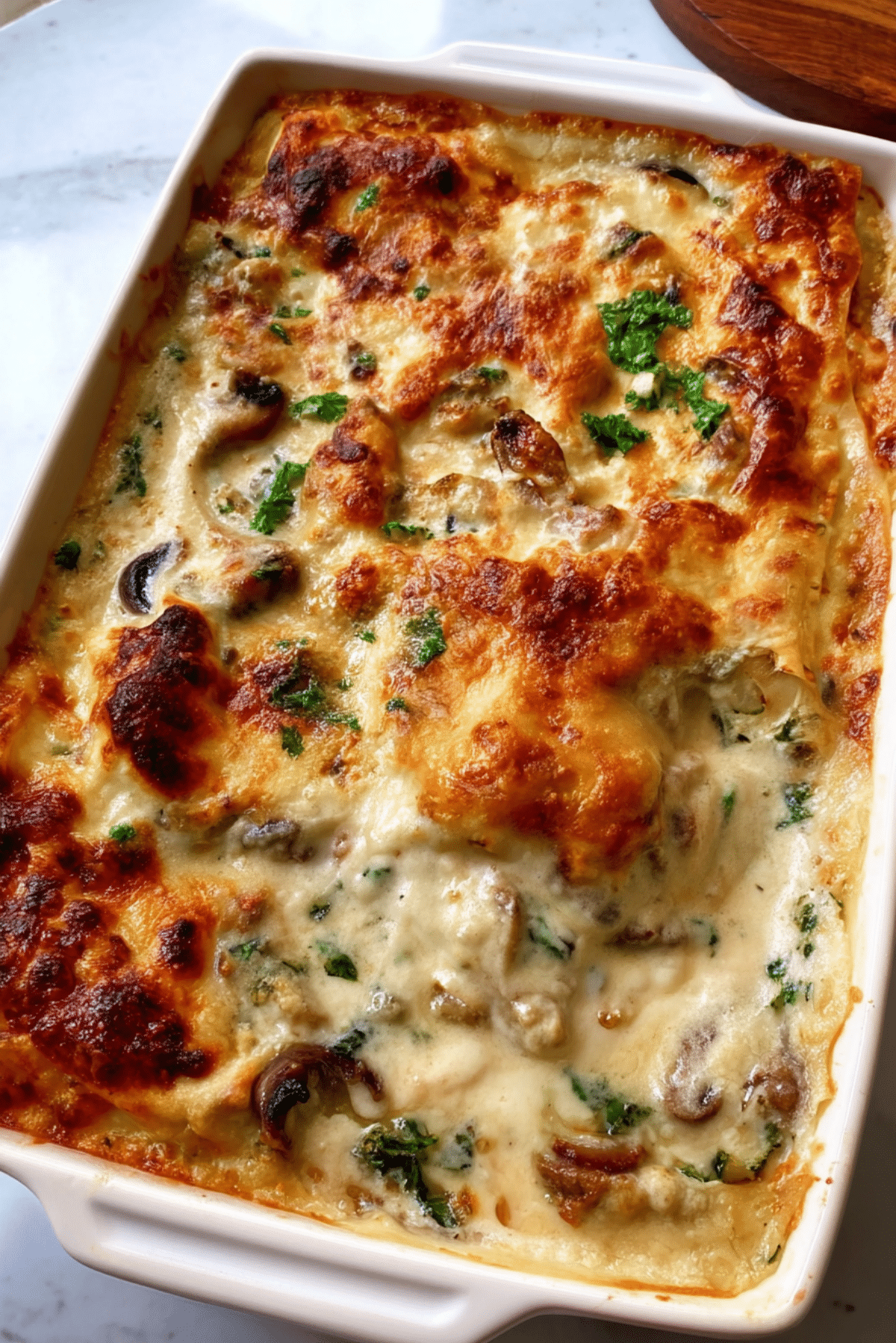 white lasagna with greens, gruyere, and garlic