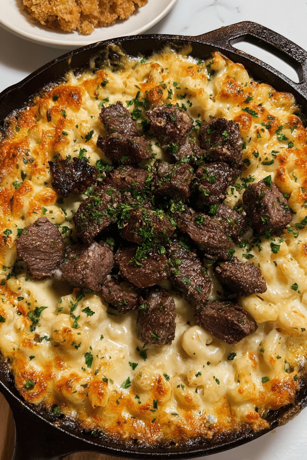Garlic Butter Steak Bites with White Truffle Mac & Cheese
