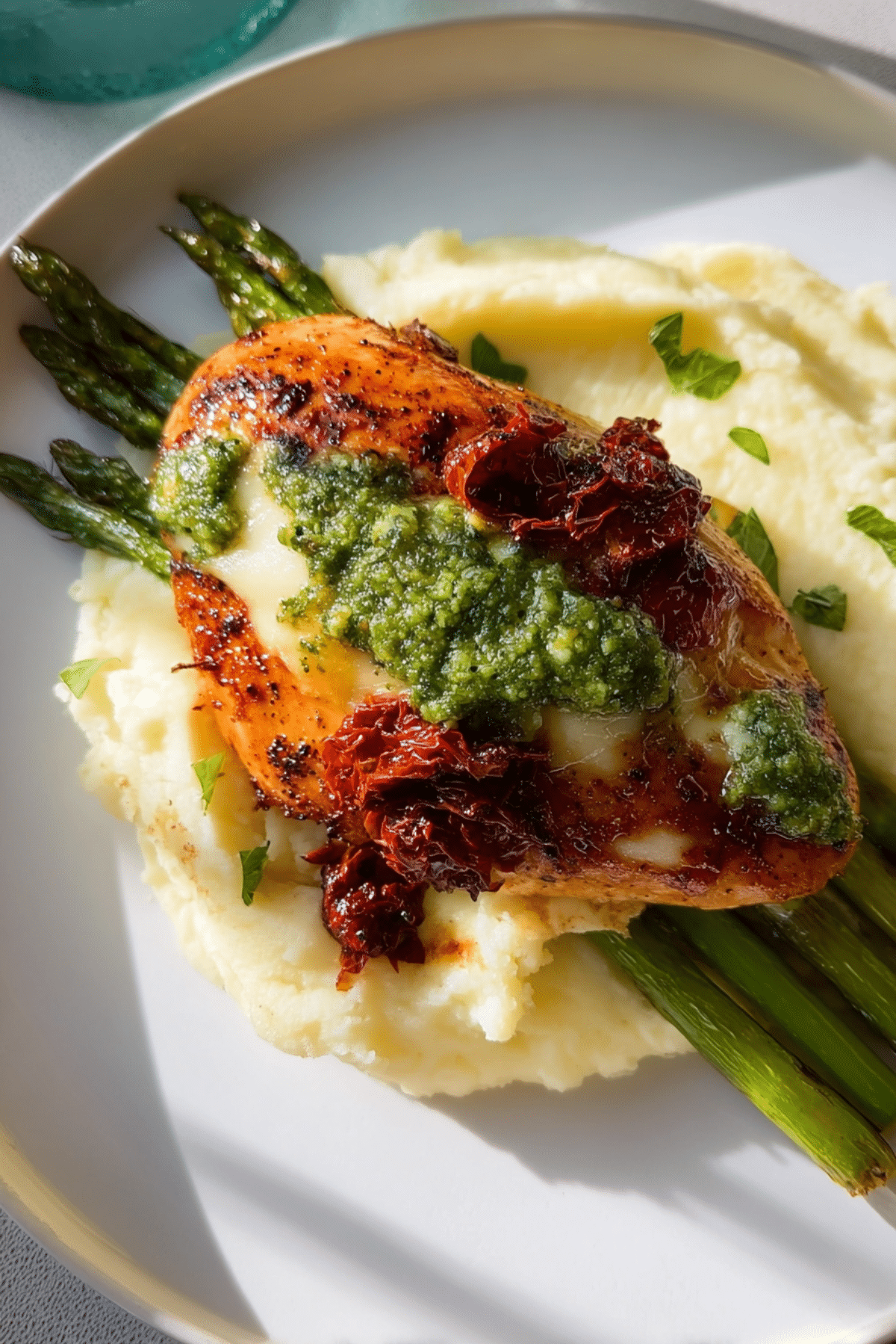 CHEESY ASPARAGUS STUFFED CHICKEN with SUN-DRIED TOMATOES & PESTO