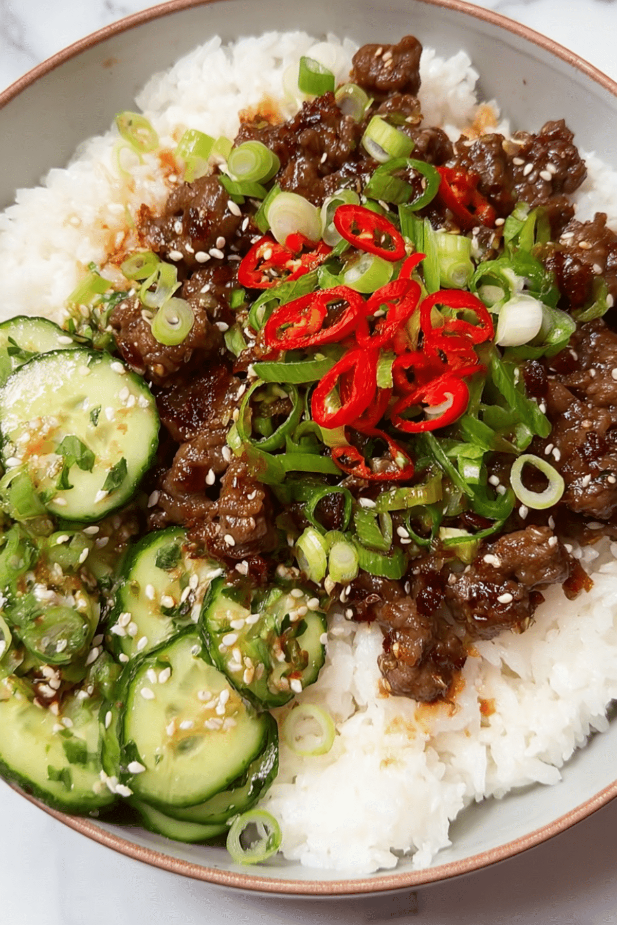 EASY 30 minute Sticky Chili Beef with a smashed cucumber salad