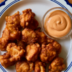Crispy Chicken Nuggets with Raising Cane's Sauce